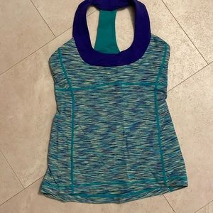 Teal/purple Lululemon size 6 neon green with mesh back and sides. Size 6.